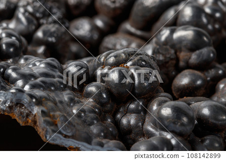 Macro mineral Hematite stone on a white background close-up 108142899