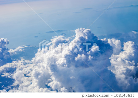 Cumulus huge storm clouds in blue sky at sunny light day Cumulus huge storm clouds in blue sky at sunny light day 108143635
