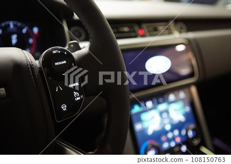Modern car interior. Shallow DOF. Steering wheel in focus 108150763