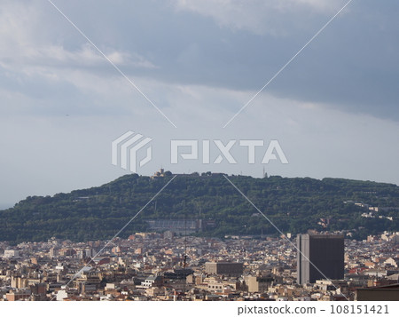 Mountain and cityscape of European city of Barcelona in Spain Mountain and cityscape of European city of Barcelona in Spain 108151421