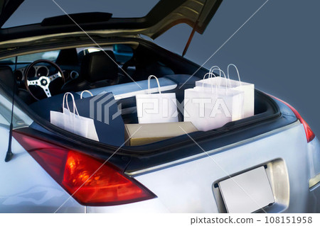 Bags full of Mockup purchases in car trunk outdoors Bags full of Mockup purchases in car trunk outdoors 108151958