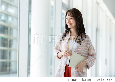 Young business woman in the office 108152357
