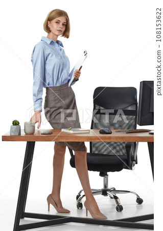 businesswoman in formal wear with clipboard in office 108153622