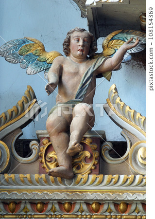 Angel statue on high altar in Franciscan church of Saint Catherine of Alexandria in Krapina, Croatia 108154369