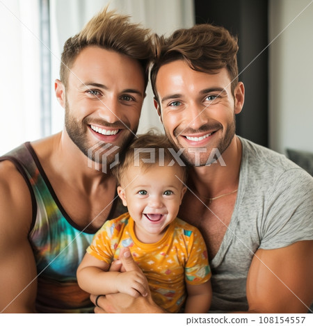 Gay couple with baby, embracing and smiling, looking to camera Gay couple with baby, embracing and smiling, looking to camera 108154557
