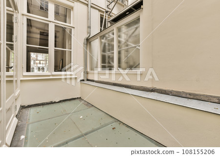 the outside of a building that has been gut and is being used as an emergency shelter for people with disabilities the outside of a building that has been gut and is being used as an emergency shelter for people with disabilities 108155206