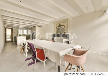 a dining room with chairs and a table in front of the wall that has been painted white to make it look like an art a dining room with chairs and a table in front of the wall that has been painted white to make it look like an art 108155260