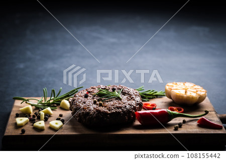 Beef burger cutlet with herbs and spices Beef burger cutlet with herbs and spices 108155442