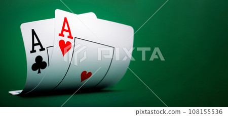 playing cards on a table 108155536