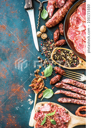 Sausages with spice and cutlery Sausages with spice and cutlery 108155880