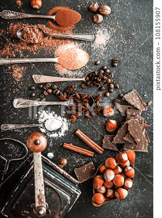 Sweet spices and chocolate on a table 108155907