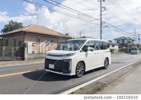 one box car minivan road driving 108156010