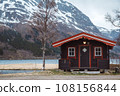 Norway rorbu houses and mountains rocks over fjord landscape scandinavian travel view Lofoten islands. Natural scandinavian landscape. 108156844