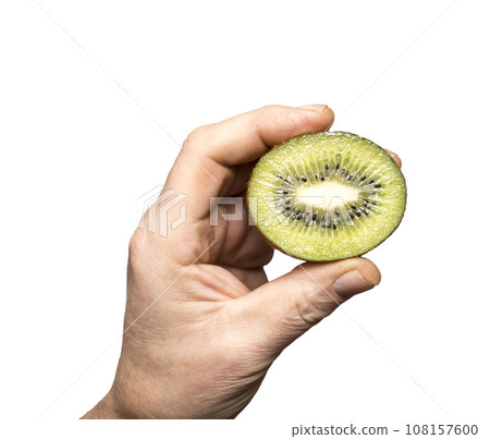 a kiwi cut in hand 108157600