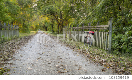 gravel touring bike on Katy Trail near Marthasville, Missouri, in fall scenery 108159419