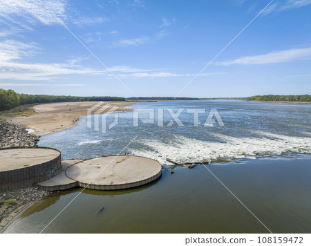 Low Water Dam with interlocking sheet piling, a rapid and fisihing beach on the Mississippi RIver below Chain of Rocks 108159472
