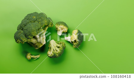 Fresh broccoli head with vibrant green color Fresh broccoli head with vibrant green color 108160418