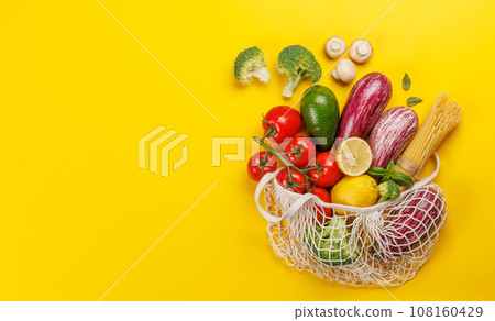 Mesh bag filled with a variety of vegetables Mesh bag filled with a variety of vegetables 108160429