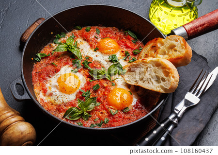 Delicious shakshuka breakfast in a pan 108160437