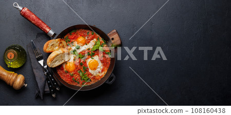 Delicious shakshuka breakfast in a pan Delicious shakshuka breakfast in a pan 108160438