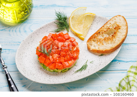 Delicious salmon and avocado tartare Delicious salmon and avocado tartare 108160460