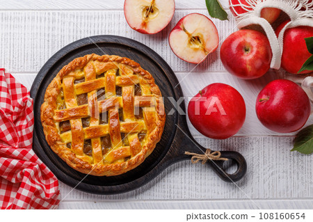 Delicious Apple Pie with Fresh Red Apples Delicious Apple Pie with Fresh Red Apples 108160654