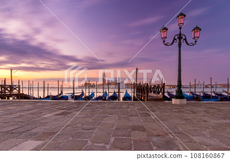 The large Venetian lagoon and the island of San Giorgio Maggiore at dawn. The large Venetian lagoon and the island of San Giorgio Maggiore at dawn. 108160867