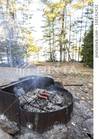 sausages grilled on a barbecue 108162432