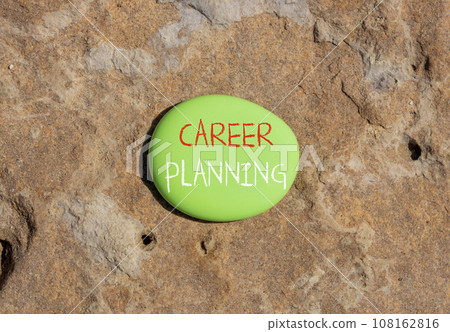 Career planning symbol. Concept words Career planning on beautiful green stone. Beautiful brown stone background. Business, motivational career planning concept. Copy space. Career planning symbol. Concept words Career planning on beautiful green stone. Beautiful brown stone background. Business, motivational career planning concept. Copy space. 108162816