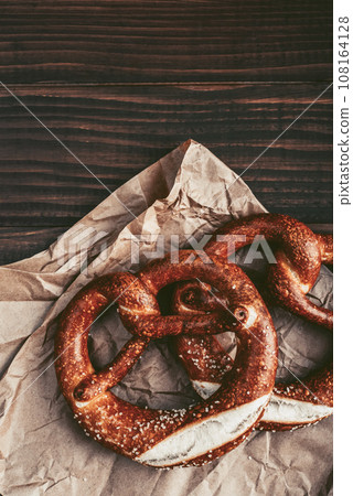 Two soft pretzels with sesame seeds Two soft pretzels with sesame seeds 108164128