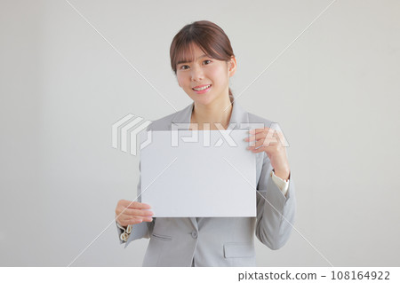 Young woman with a message board 2 Young woman with a message board 2 108164922