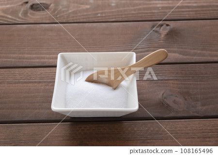 salt and wooden spoon 108165496