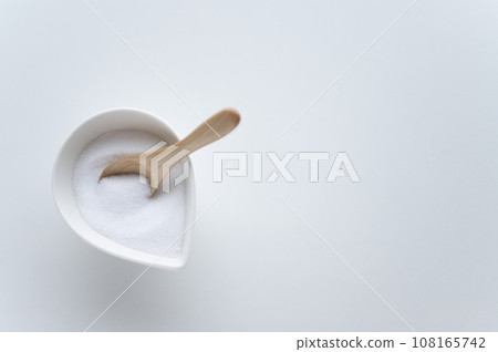 salt and wooden spoon salt and wooden spoon 108165742