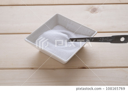 salt and measuring spoon salt and measuring spoon 108165769