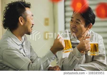 Workers toasting 108165951