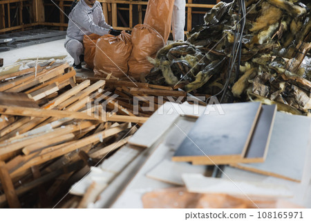 Workers working at a construction site 108165971