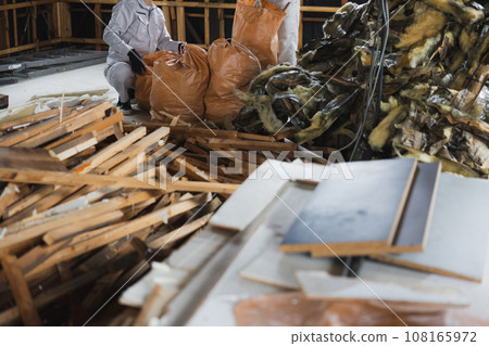 Workers working at a construction site 108165972