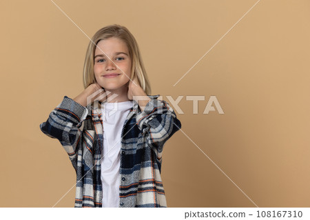 Blonde teen girl looking peaceful and relaxed Blonde teen girl looking peaceful and relaxed 108167310