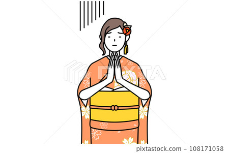 A woman in a long-sleeved kimono apologizes by putting her hands together in front of her body, at New Year's shrine visits, coming-of-age ceremonies, graduation ceremonies, weddings, etc. 108171058