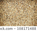 Mixed seed for feed bird as nature food background - Top view of white , brown and black grains. 108171488