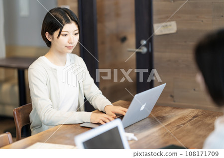 Young woman working in creative office Young woman working in creative office 108171709