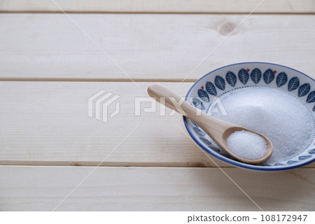 salt and wooden spoon 108172947