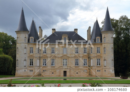 The building of a chateau (wine brewery) in the Médoc area, a famous wine-producing region north of Bordeaux, France The building of a chateau (wine brewery) in the Médoc area, a famous wine-producing region north of Bordeaux, France 108174680