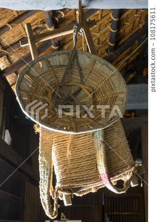Hanging backpack and sedge hat 108175611