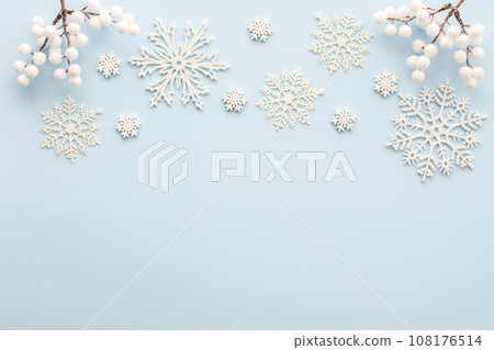 White snowflakes on a blue background 108176514