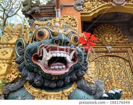 Traditional old ancient Balinese statue of demon angel called barong bali guarding sacred ritual temple Traditional old ancient Balinese statue of demon angel called barong bali guarding sacred ritual temple 108176849