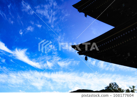 Landscape of Japanese style architecture roof silhouette and blue sky and clouds Landscape of Japanese style architecture roof silhouette and blue sky and clouds 108177604