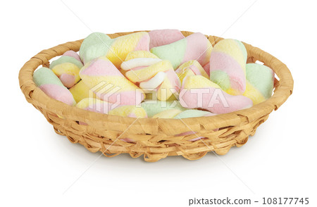 Colorful mini marshmallows in a wicker basket isolated on white background with full depth of field 108177745