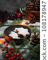 Christmas cinnamon cookies (spice-cake) and New Year's decoration 108178947