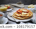 French cuisine. Matefaim. Sweet Apple Pancakes, butter and caramelized apples 108179157
